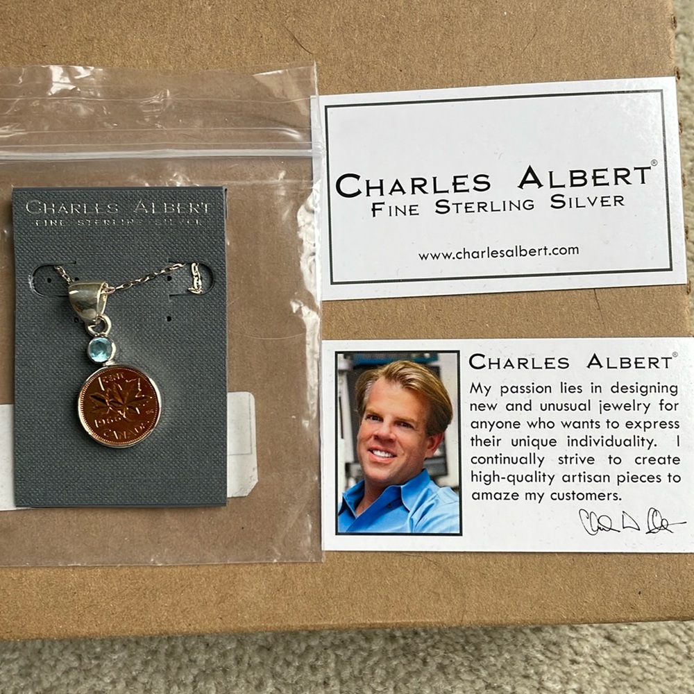 Charles Albert CDN PENNY & Topaz